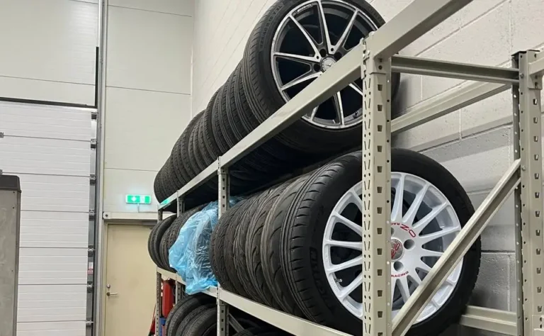 Racks of tyres and wheels in storage at the Ariol Auto workshop